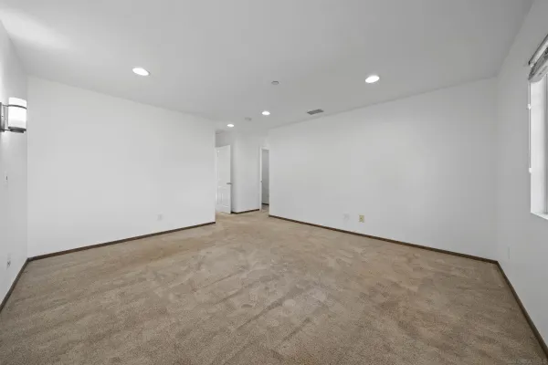 a bathroom with a glass door shower