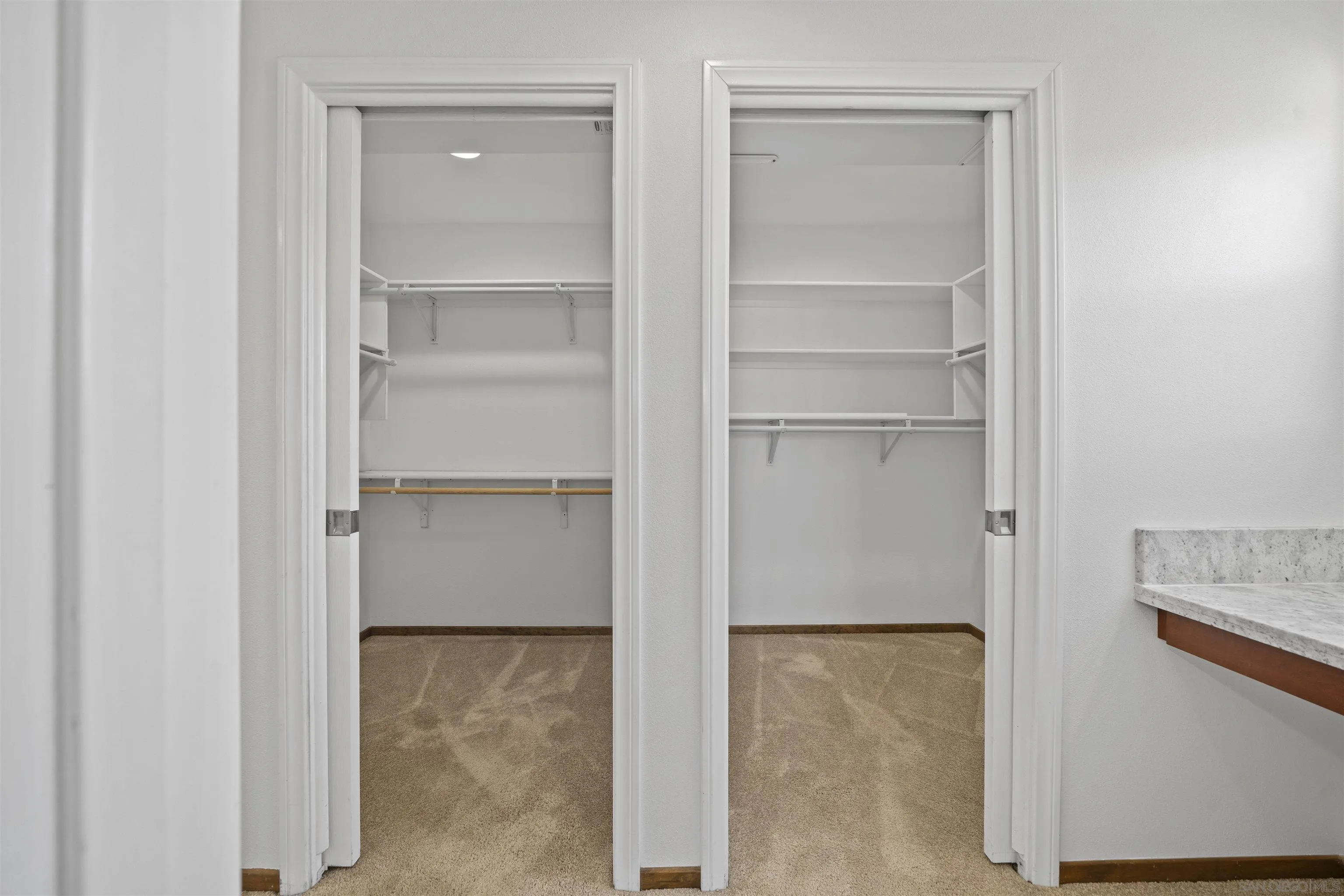 20872 Deerhorn Valley Road Jamul, CA 91935 - Photo 30 of 64 a view of walk in closet with empty racks