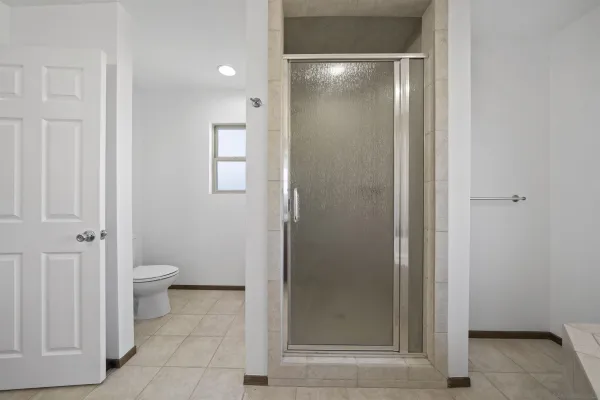 a view of a backyard with sitting area