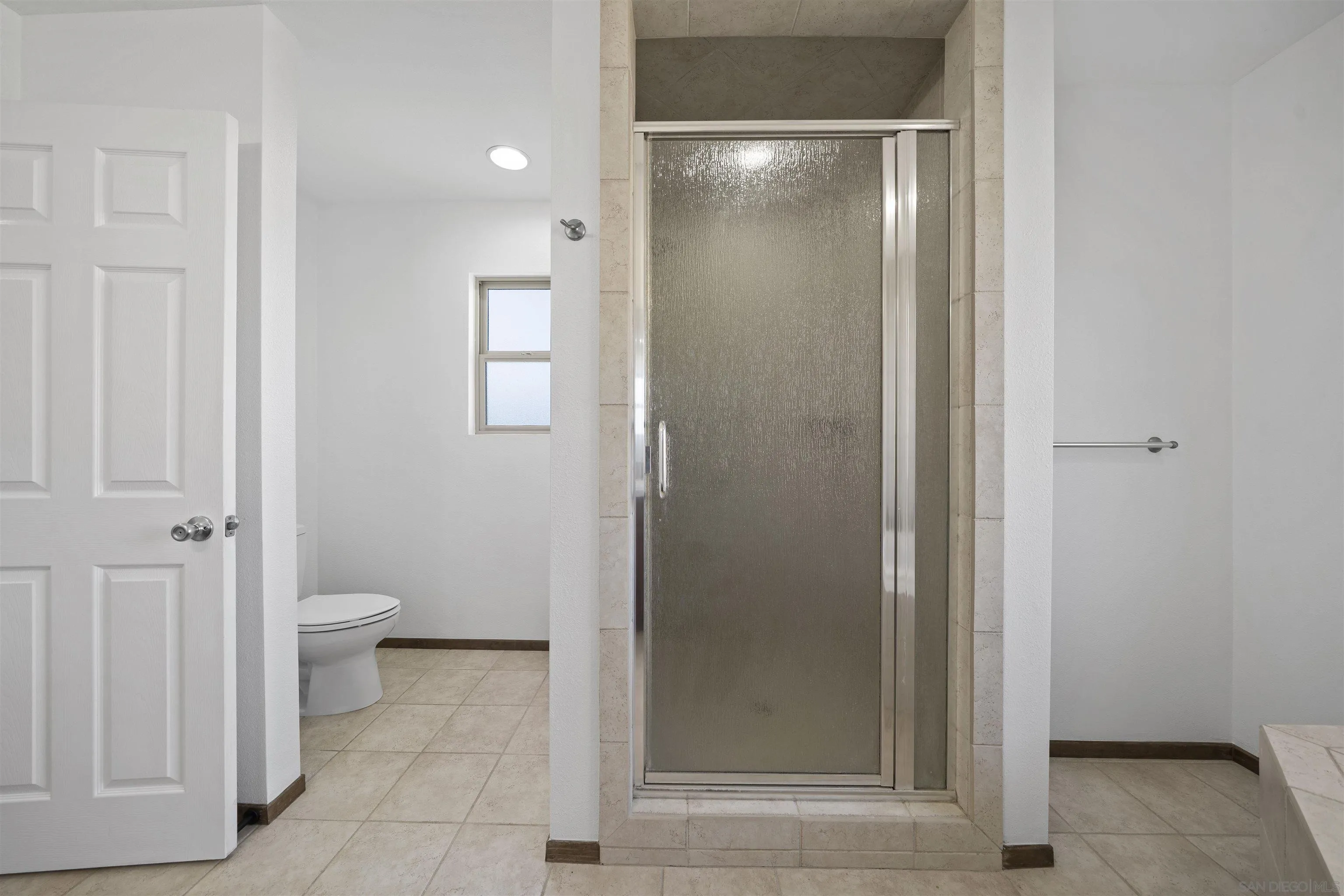 20872 Deerhorn Valley Road Jamul, CA 91935 - Photo 35 of 64 a bathroom with a glass door shower