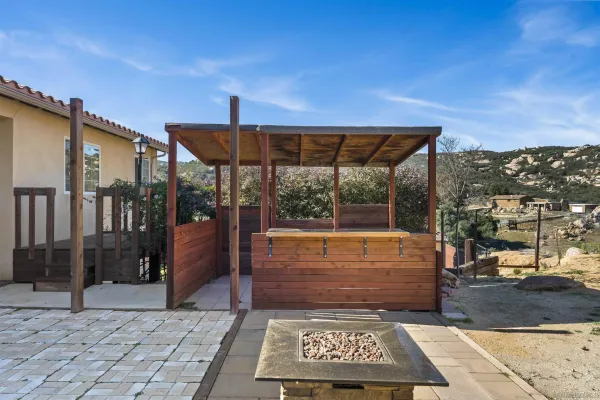 a view of a swimming pool with a yard