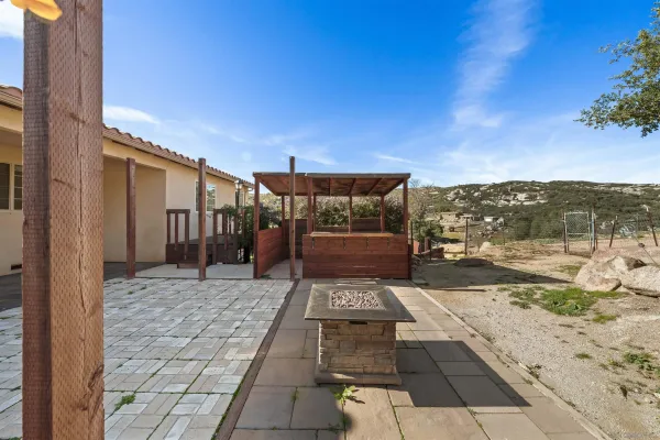 a view of a swimming pool with a patio