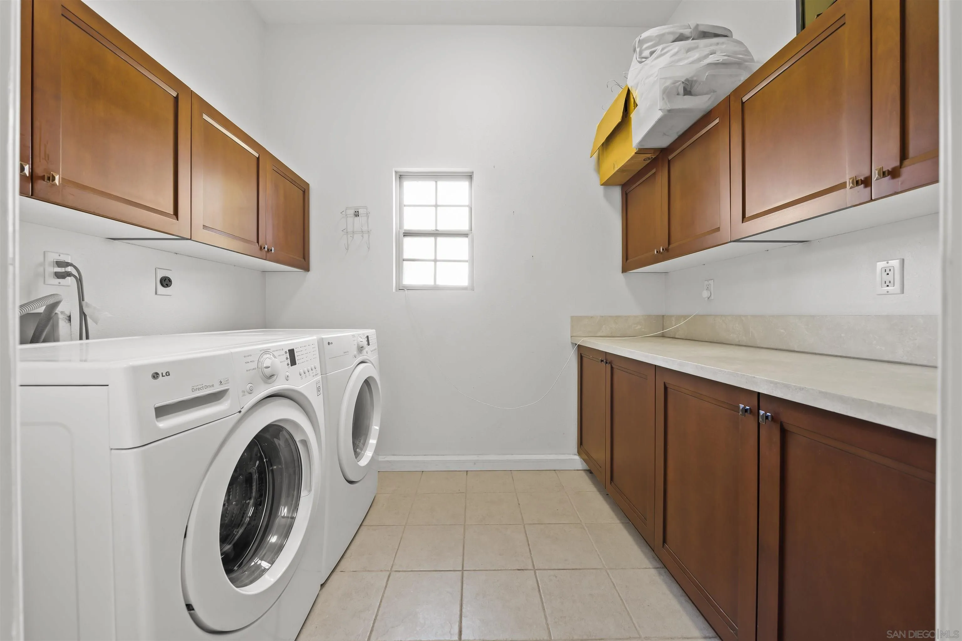 20872 Deerhorn Valley Road Jamul, CA 91935 - Photo 54 of 64 a utility room with dryer and washer