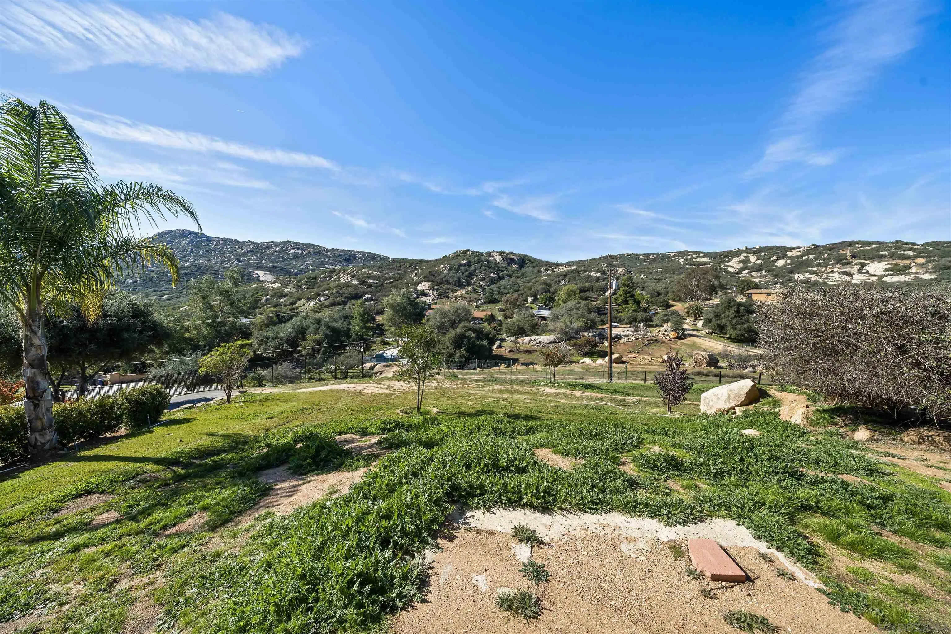 20872 Deerhorn Valley Road Jamul, CA 91935 - Photo 56 of 64 a view of a city with lush green forest