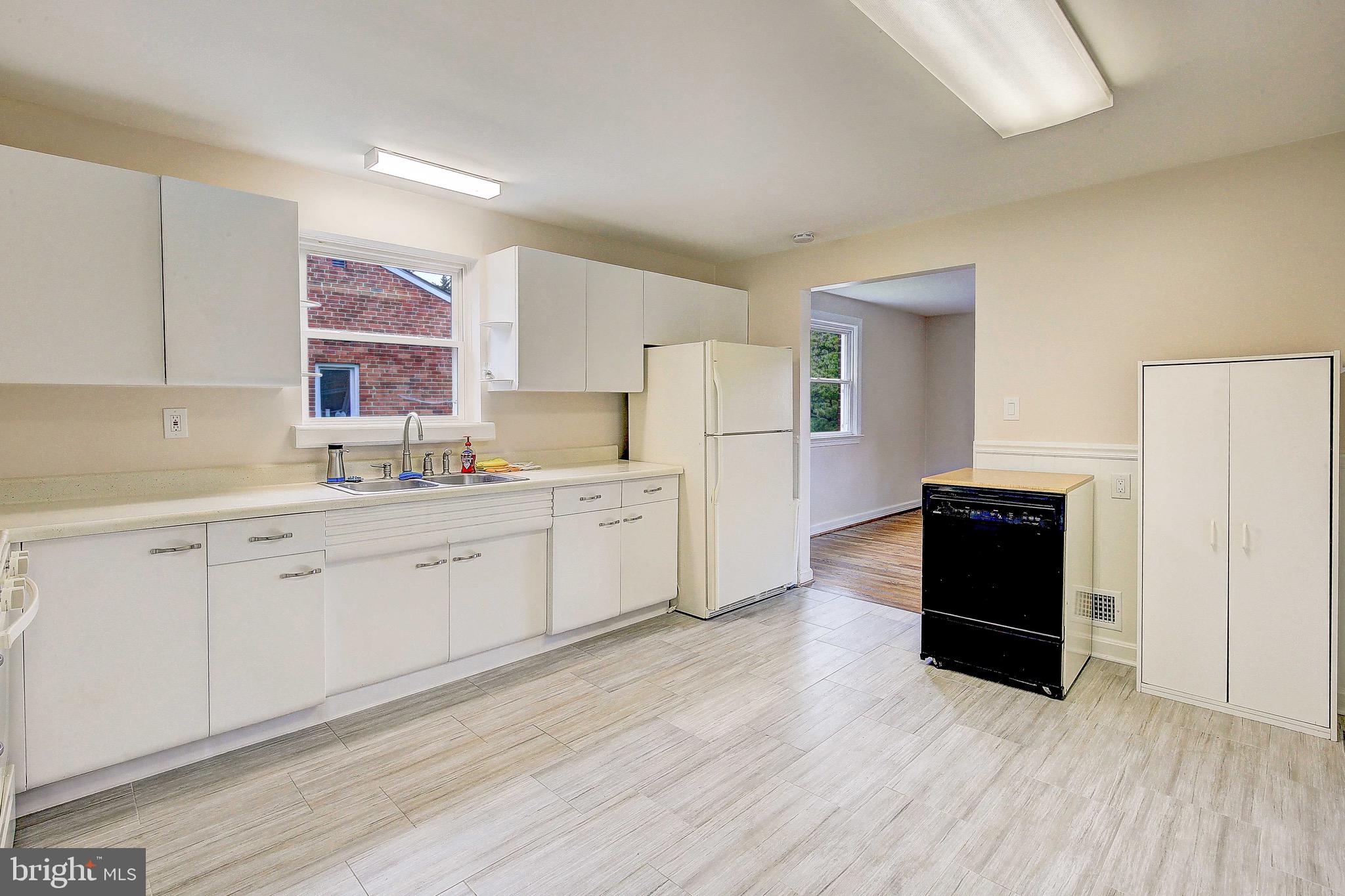 7719 Woodyard Road Clinton, MD 20735 - Photo 4 of 23 Kitchen with new flooring