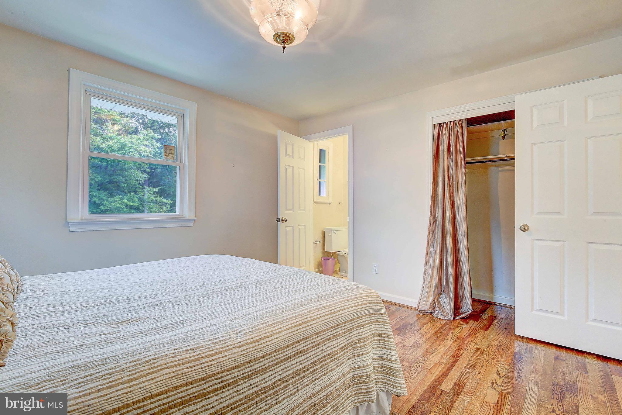 7719 Woodyard Road Clinton, MD 20735 - Photo 6 of 23 Master bedroom with half bath