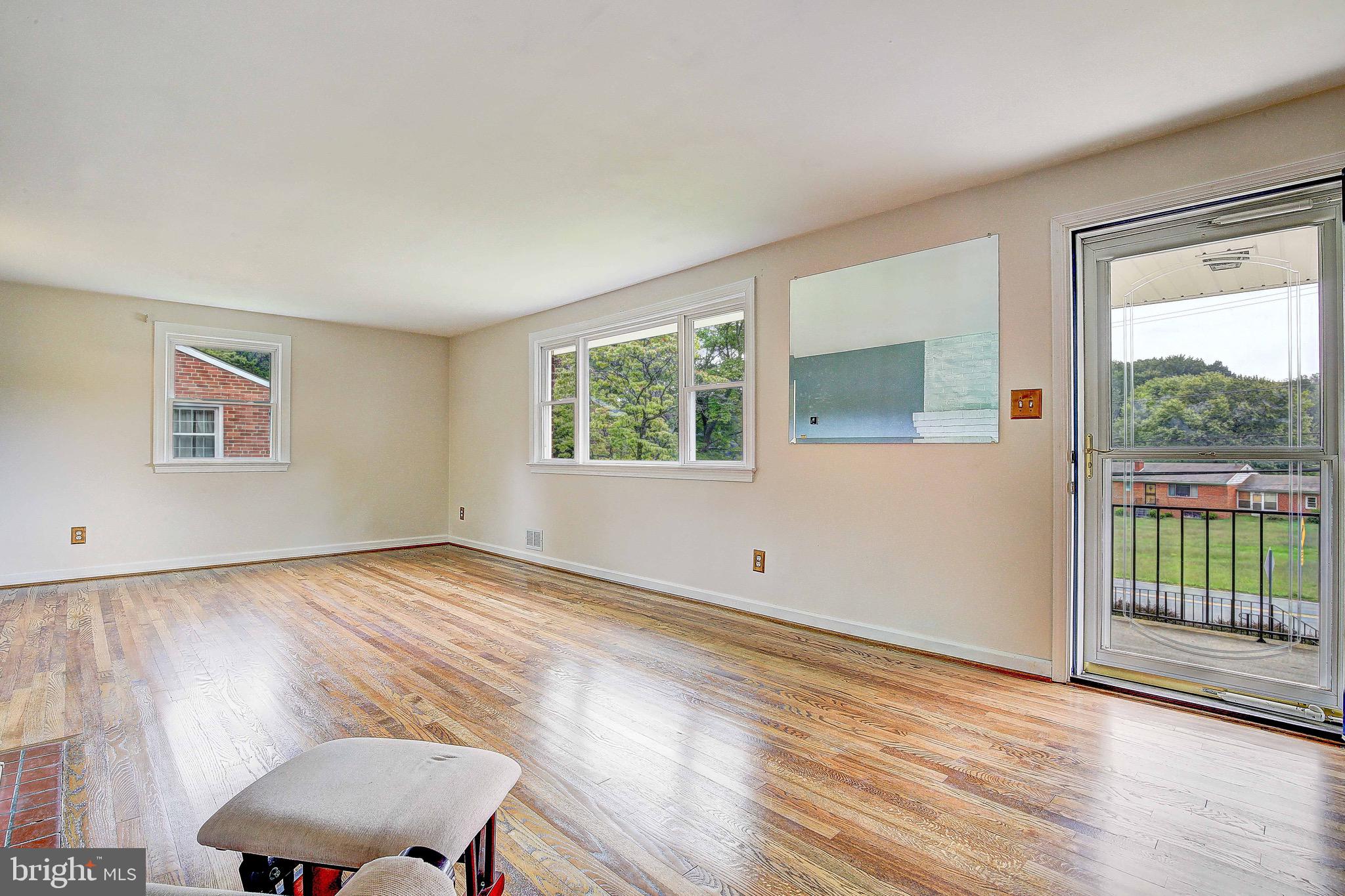 7719 Woodyard Road Clinton, MD 20735 - Photo 9 of 23 Living room with lots of natural light
