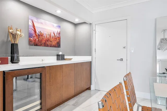 a bathroom with a double vanity sink mirror and shower