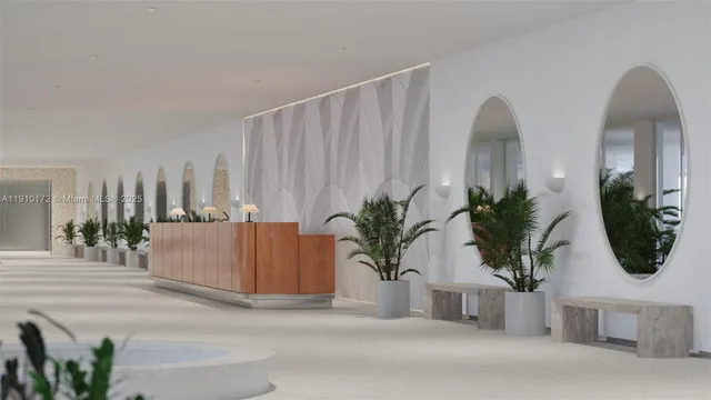 a living room with furniture potted plant and windows