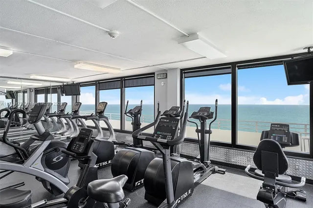 a view of outdoor space with seating area and swimming pool