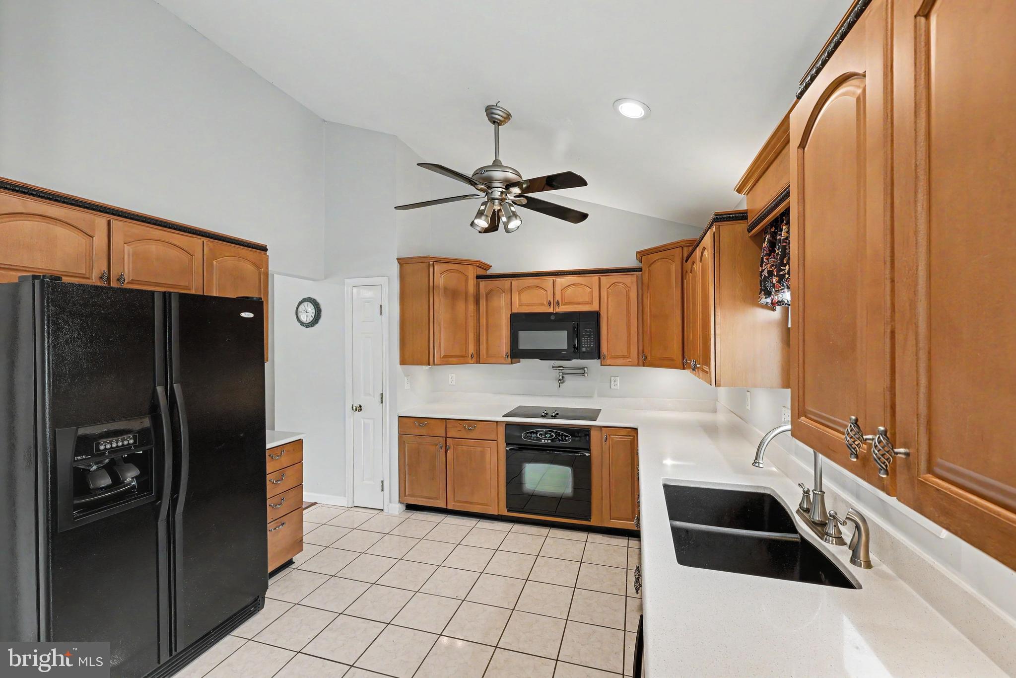 183 Choptank Road Stafford, VA 22556 - Photo 6 of 38 Kitchen w/Cathedral Ceiling & Ceiling Fan w/Light