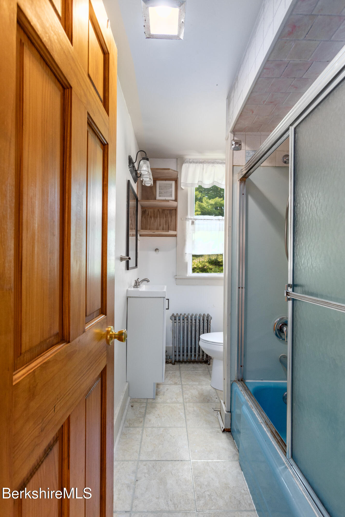 89-91 Pecks Road Pittsfield, MA 01201 - Photo 17 of 28 a bathroom with a tub a sink and a shower