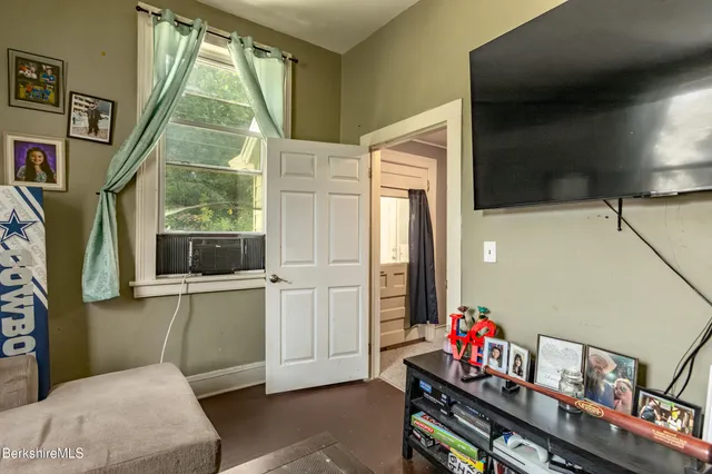 a room with furniture and a window