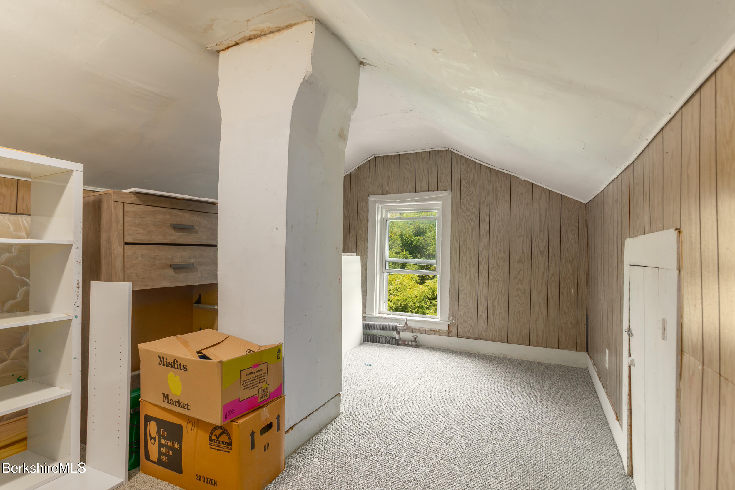 89-91 Pecks Road Pittsfield, MA 01201 - Photo 27 of 28 a room that has a bed and a closet in it