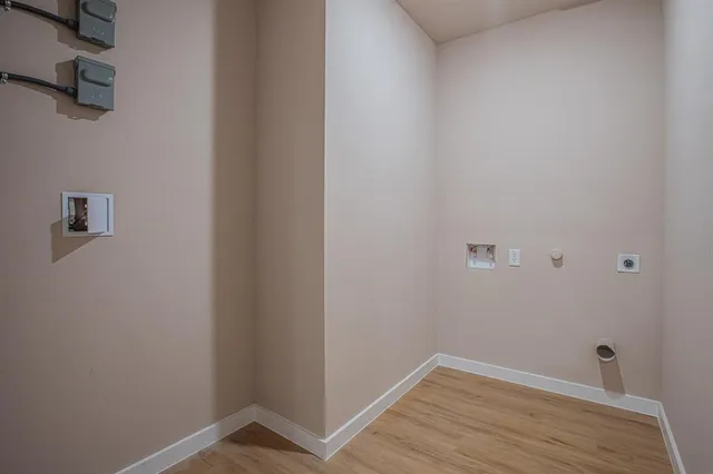 a view of small space with wooden floor