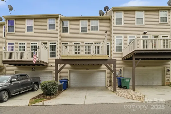 a front view of a house with a garage