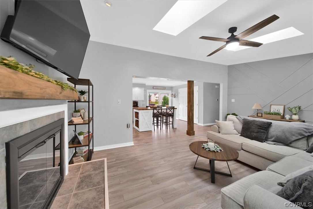 7719 Drexelbrook Road Chesterfield, VA 23832 - Photo 13 of 49 a living room with furniture and a fireplace