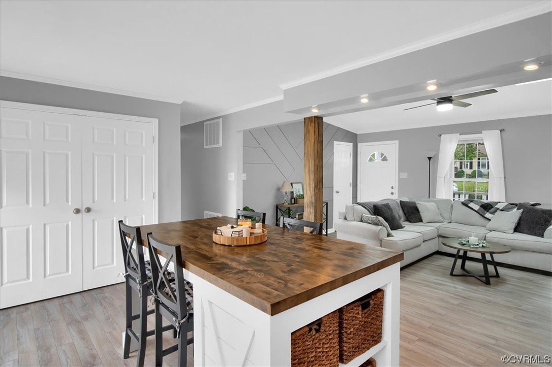 7719 Drexelbrook Road Chesterfield, VA 23832 - Photo 18 of 49 a living room with dining table and wooden floor
