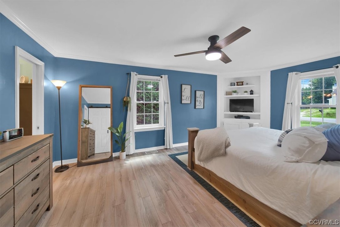 7719 Drexelbrook Road Chesterfield, VA 23832 - Photo 22 of 49 a living room with furniture and a flat screen tv