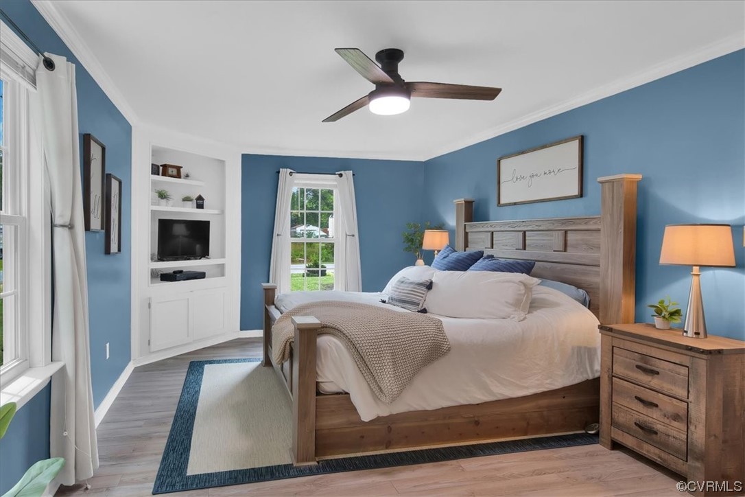 7719 Drexelbrook Road Chesterfield, VA 23832 - Photo 26 of 49 a bedroom with a large bed and a lamp on dresser