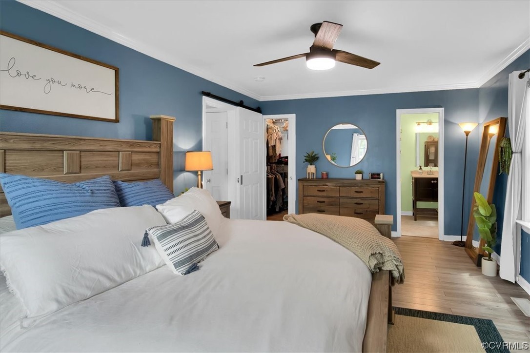 7719 Drexelbrook Road Chesterfield, VA 23832 - Photo 28 of 49 a bed room with a bed mirror and a night stand