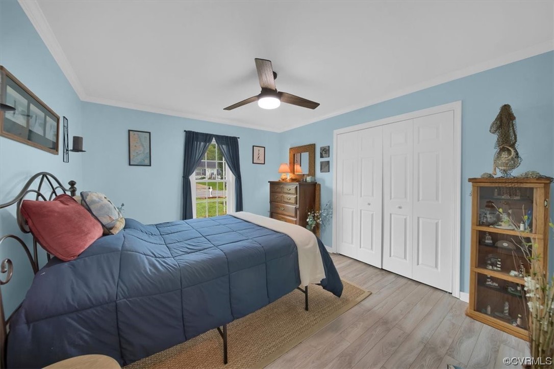 7719 Drexelbrook Road Chesterfield, VA 23832 - Photo 37 of 49 a bedroom with a bed and wooden floor