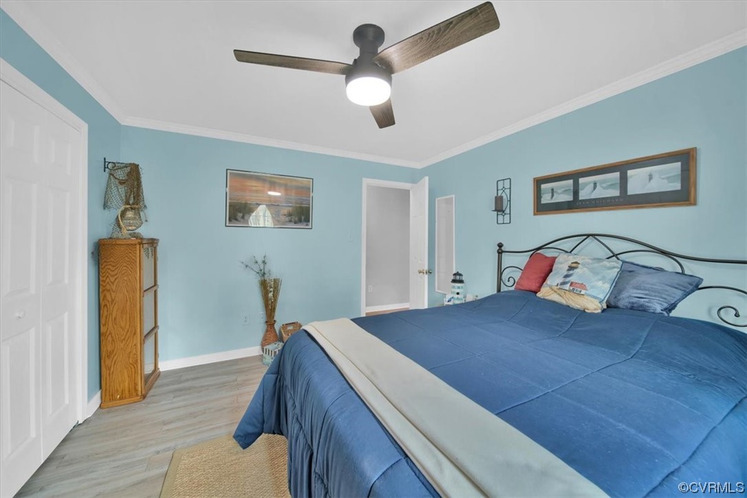 7719 Drexelbrook Road Chesterfield, VA 23832 - Photo 38 of 49 a bedroom with a bed and a chandelier