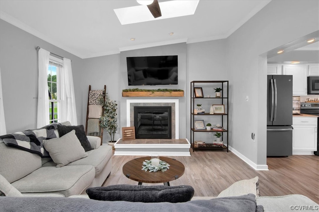 7719 Drexelbrook Road Chesterfield, VA 23832 - Photo 9 of 49 a living room with furniture and a fireplace