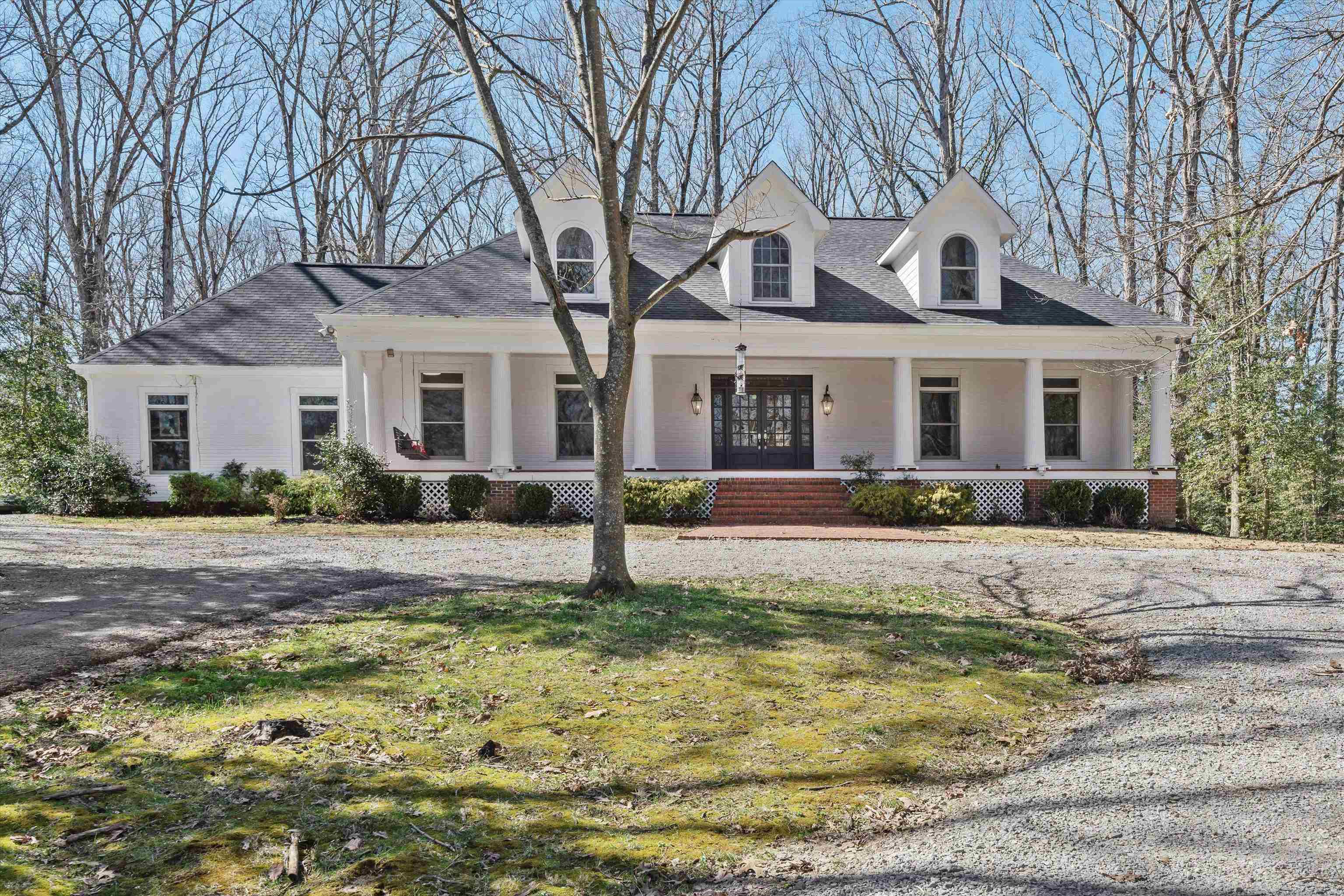 1805 Russell Road Bolivar, TN 38008 - Photo 1 of 39 View of front facade with a porch and a front lawn
