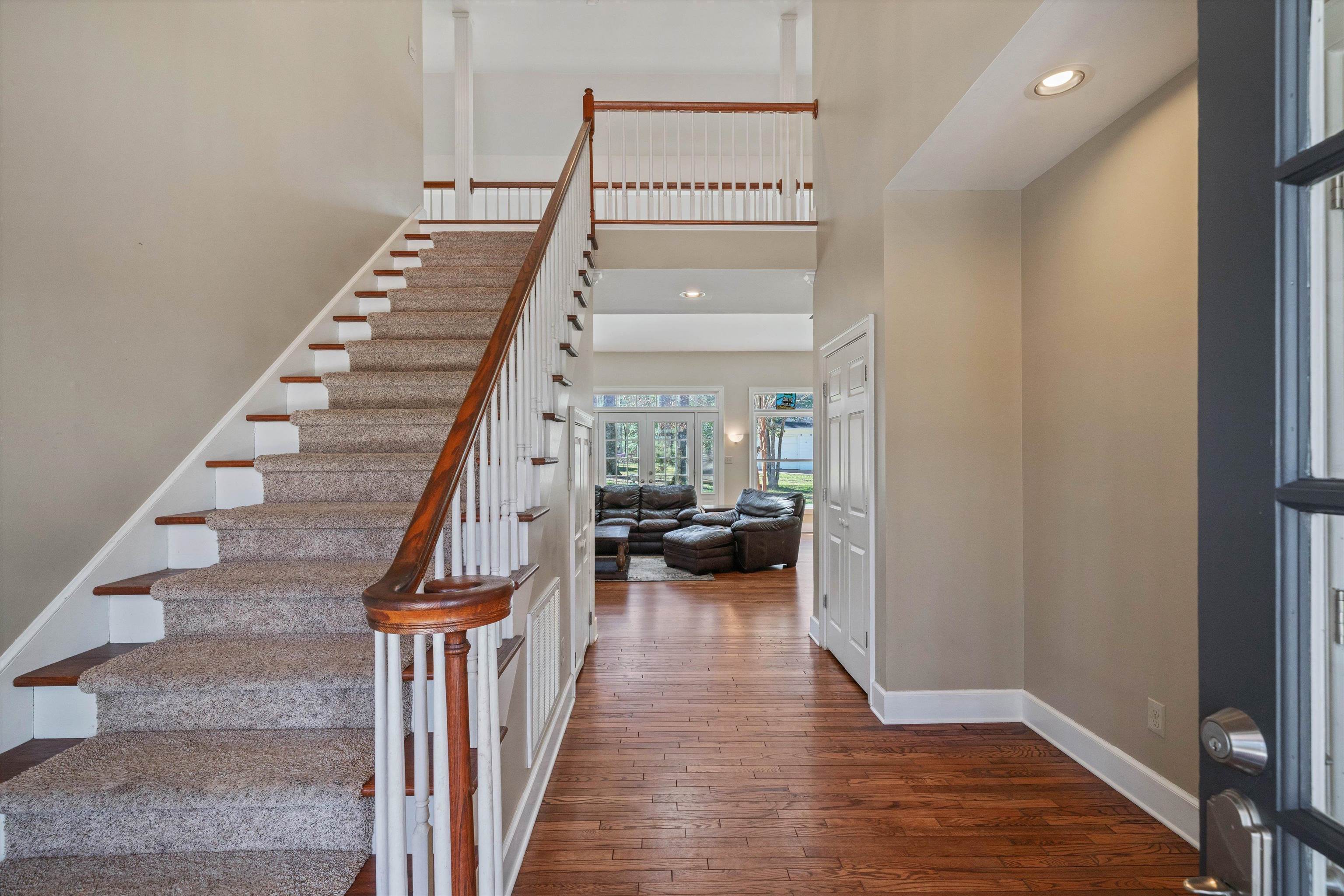 1805 Russell Road Bolivar, TN 38008 - Photo 3 of 39 Entryway with dark wood-type flooring, recessed lighting, a towering ceiling, and baseboards
