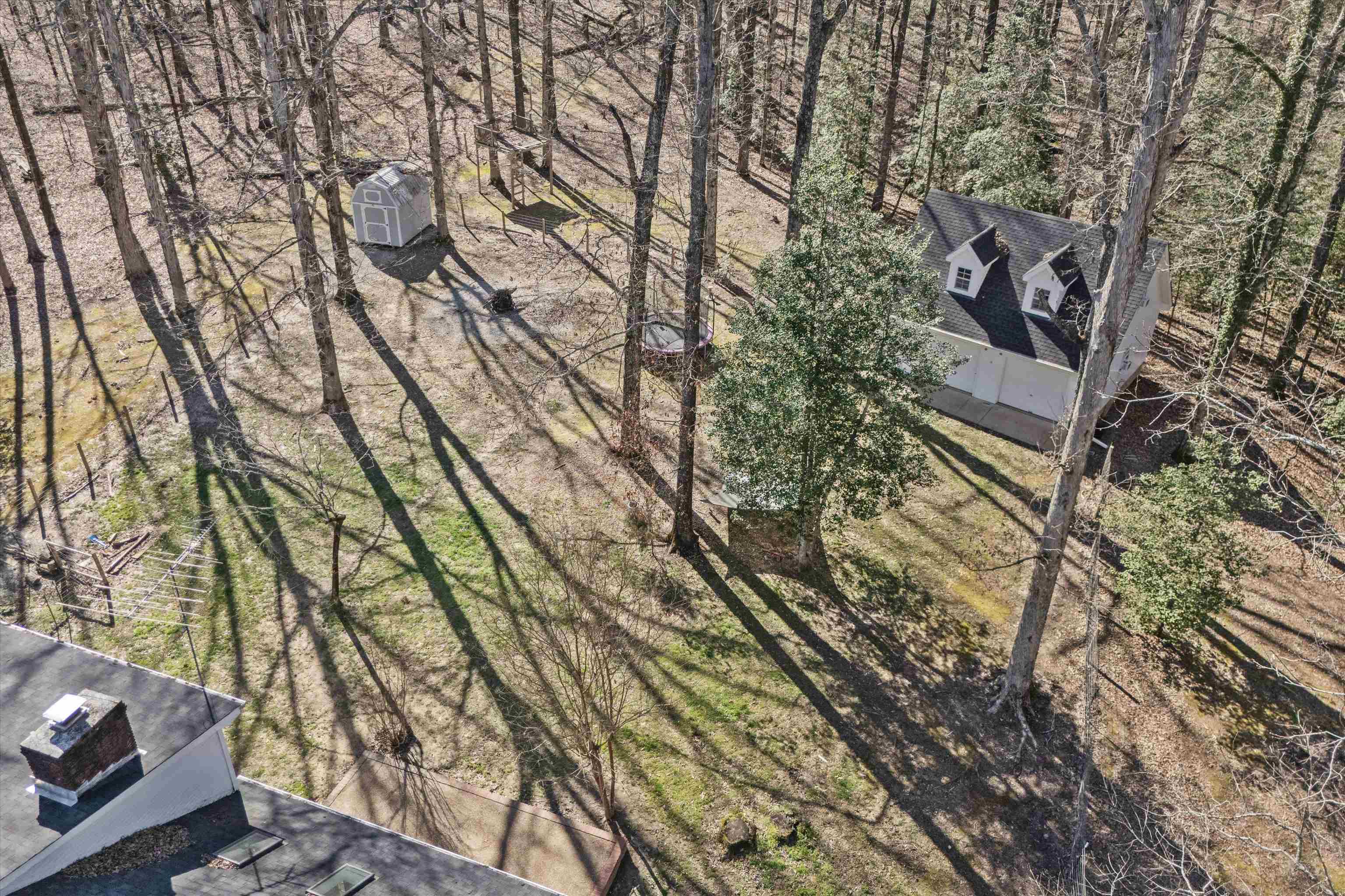 1805 Russell Road Bolivar, TN 38008 - Photo 35 of 39 Drone / aerial view with a view of trees