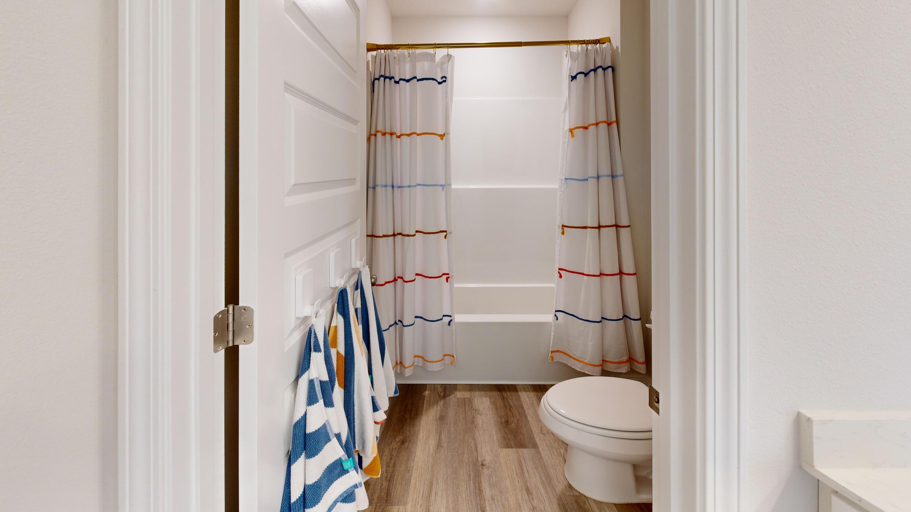 8130 Fir Tree Drive Milton, FL 32583 - Photo 13 of 17 a bathroom with a toilet and a shower