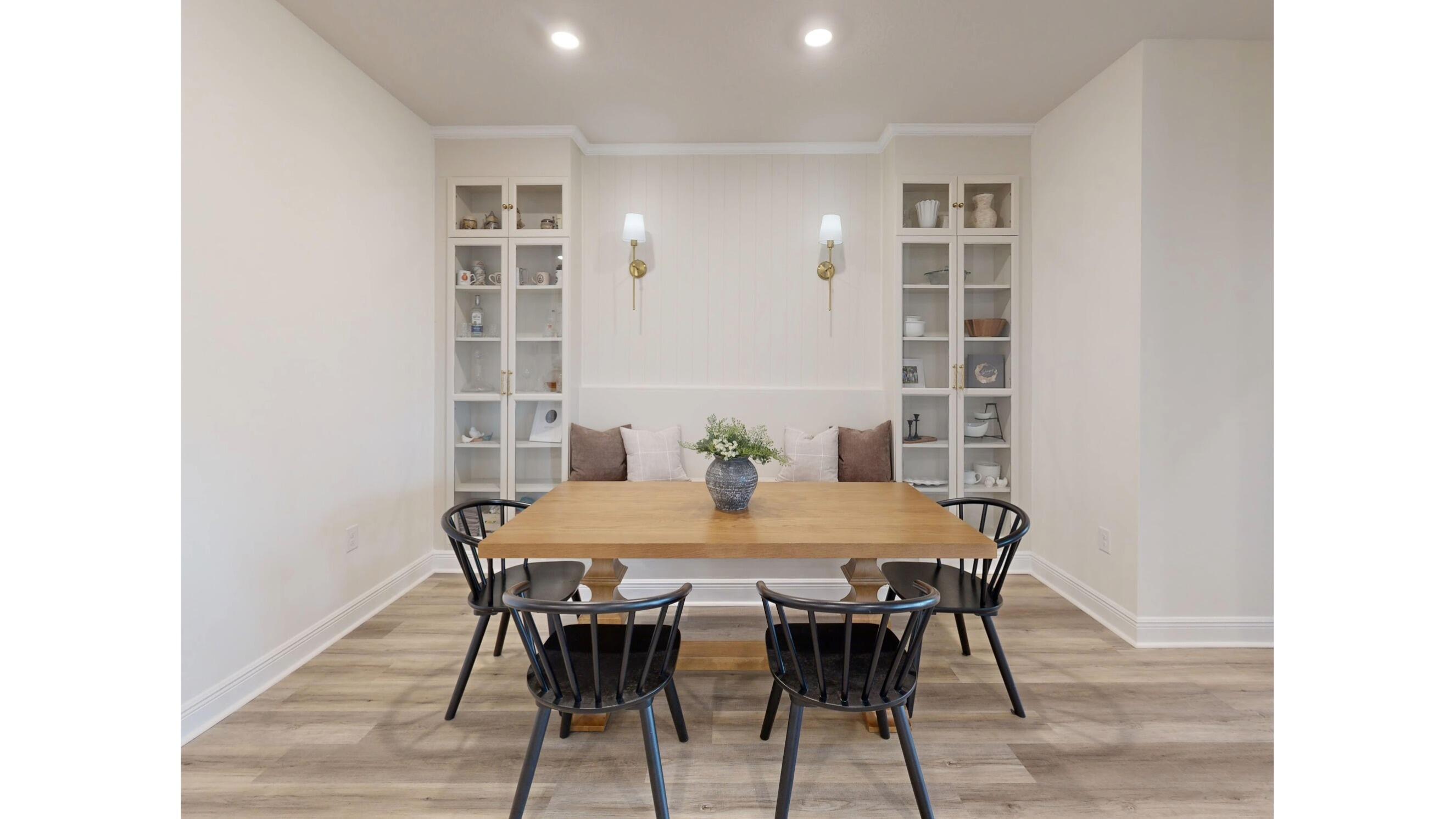 8130 Fir Tree Drive Milton, FL 32583 - Photo 17 of 17 a view of a dining room with furniture and wooden floor