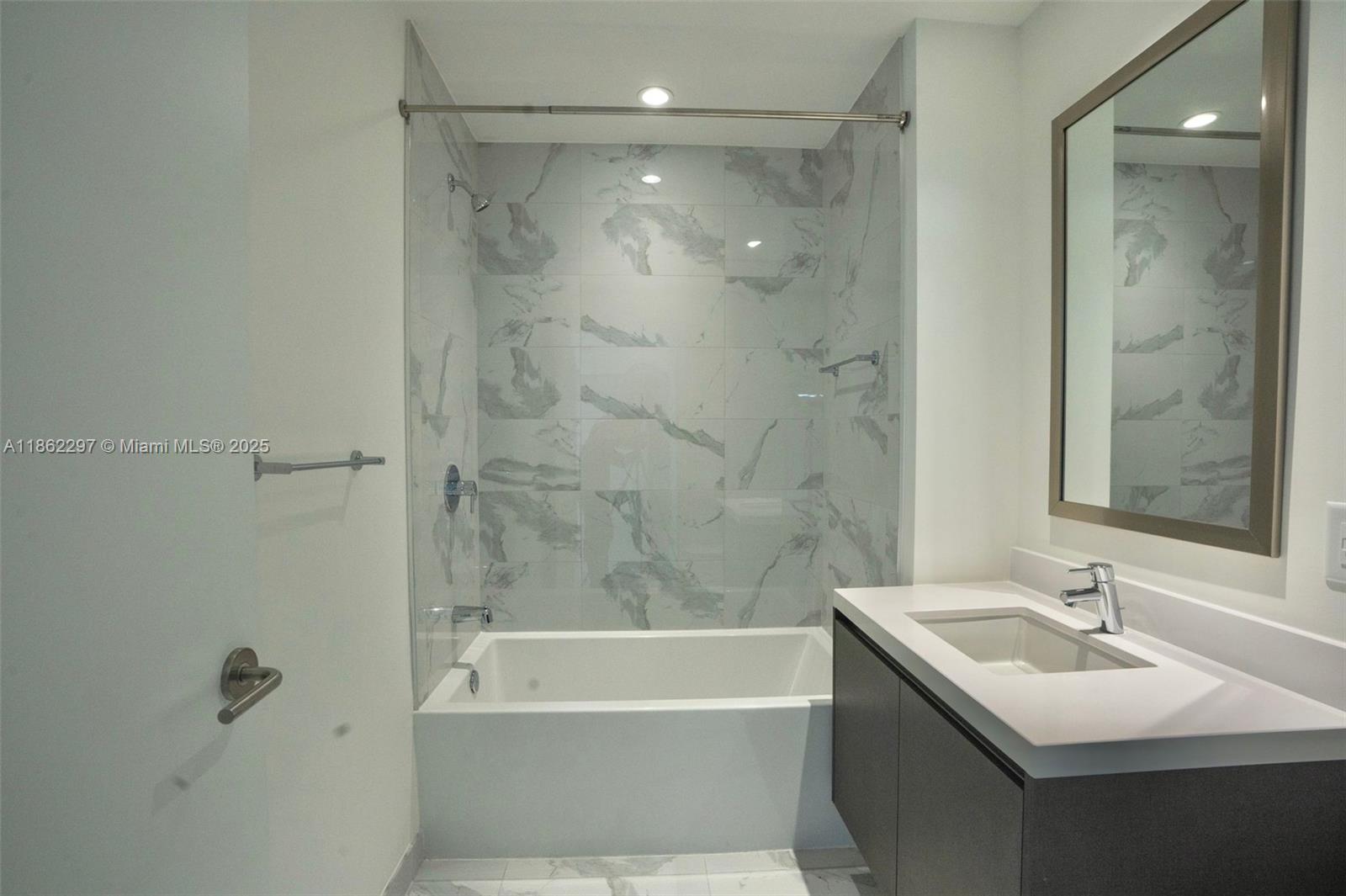 Park West Miami, FL 33132 - Photo 12 of 20 a bathroom with a sink toilet and shower