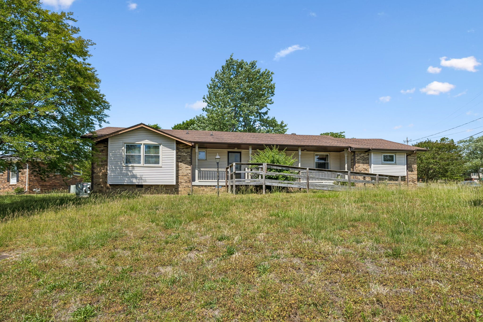 1246 Apache Lane Madison, TN 37115 - Photo 2 of 21 a front view of a house with a yard