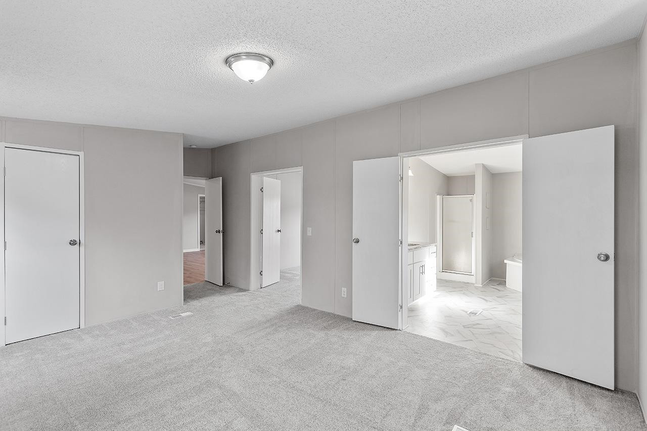 8401 South Creek Road Willow Spring, NC 27592 - Photo 12 of 24 a view of empty room