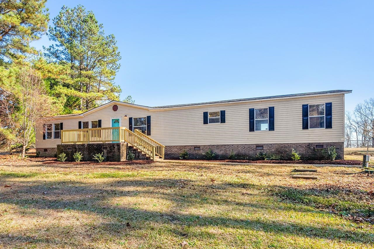 8401 South Creek Road Willow Spring, NC 27592 - Photo 2 of 24 a view of swimming pool with outdoor seating