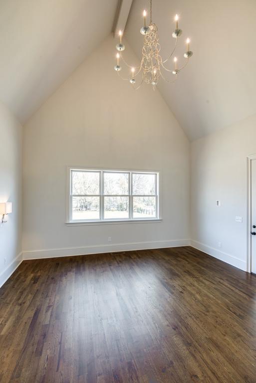 5622 Valley View Road Brentwood, TN 37027 - Photo 15 of 28 an empty room with wooden floor and windows