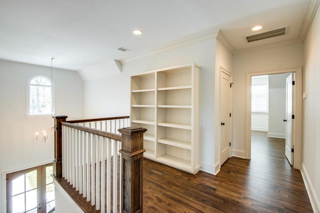 5622 Valley View Road Brentwood, TN 37027 - Photo 21 of 28 a view of a hallway with wooden floor and closet