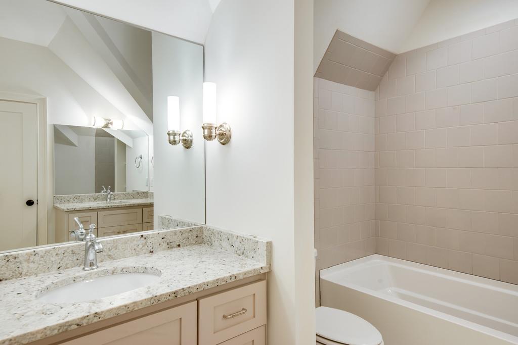 5622 Valley View Road Brentwood, TN 37027 - Photo 22 of 28 a bathroom with a granite countertop sink toilet and shower