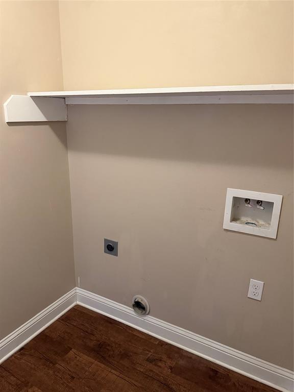 520 Big Red Circle Haughton, LA 71037 - Photo 18 of 25 Laundry area featuring wood-finish flooring, white baseboards, and a white wall shelf