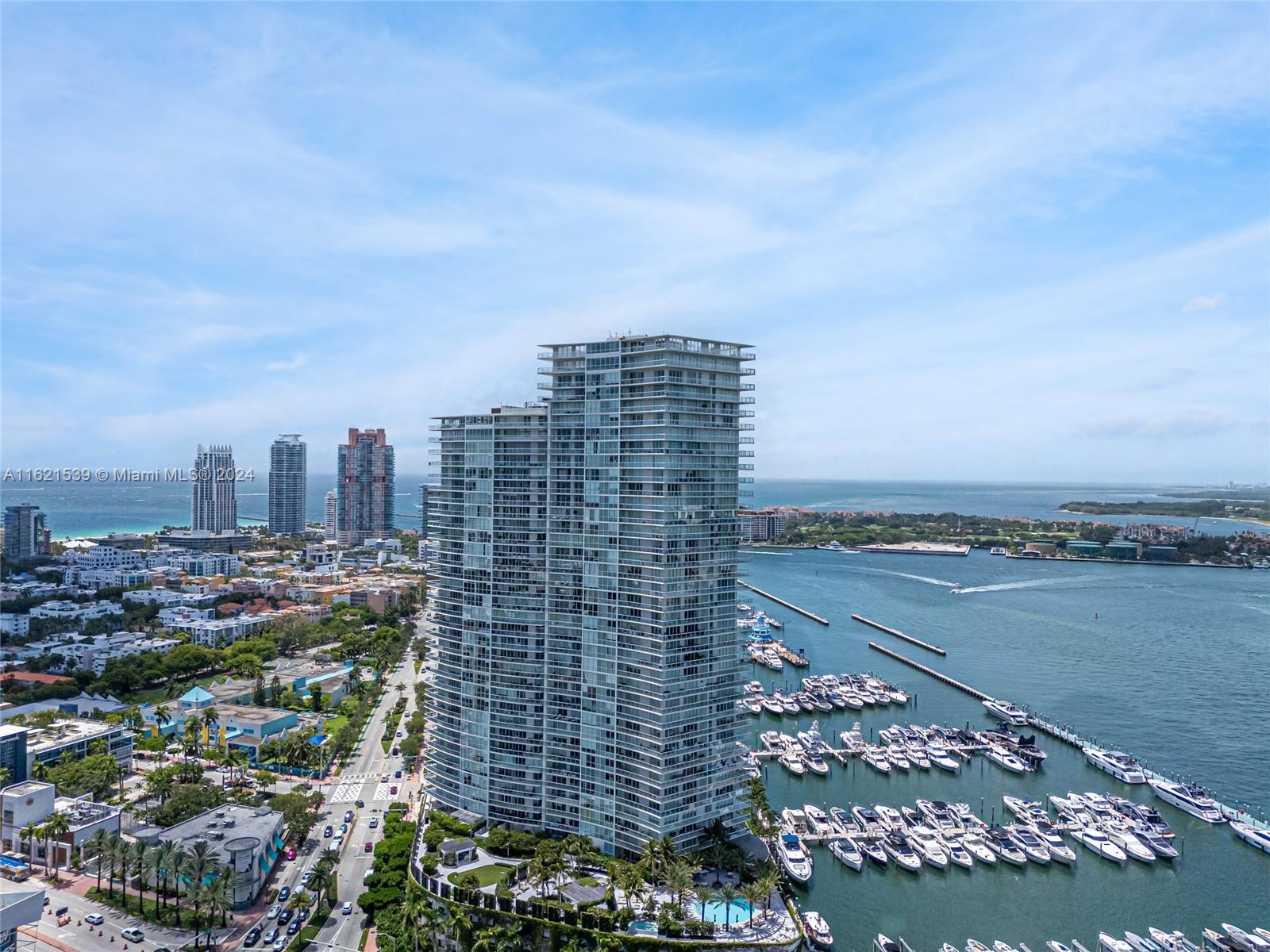 450 Alton Road, Unit 3106 Miami Beach, FL 33139 - Photo 1 of 40 a view of a city with tall buildings