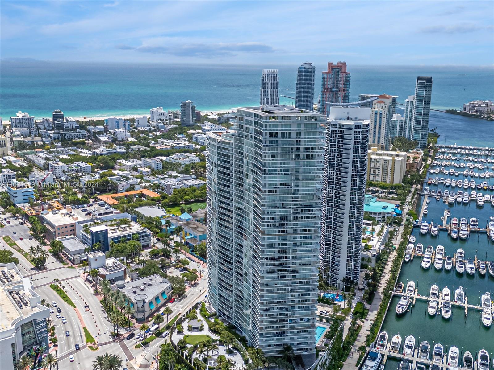 450 Alton Road, Unit 3106 Miami Beach, FL 33139 - Photo 2 of 40 a view of a city with tall buildings