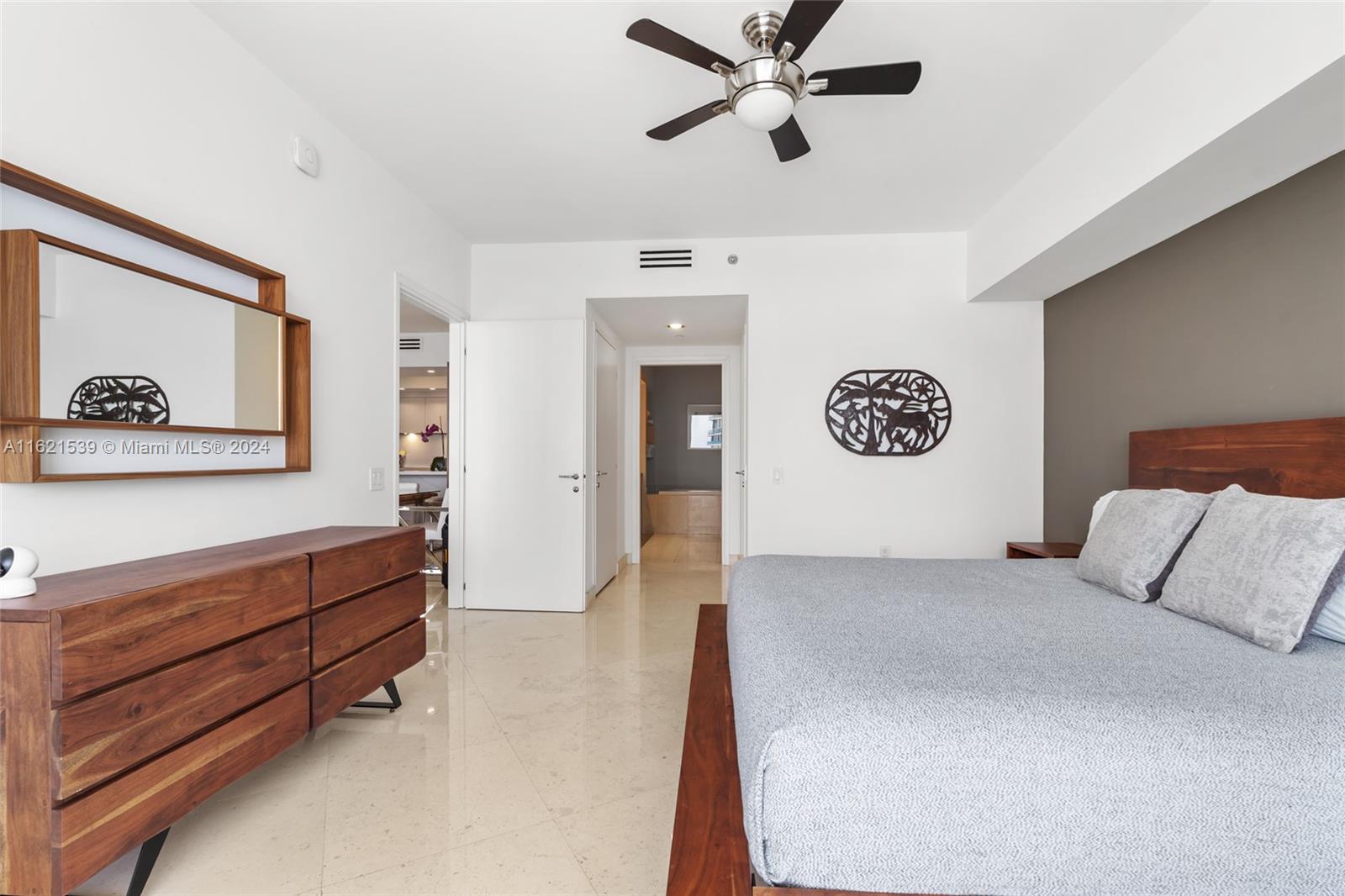 450 Alton Road, Unit 3106 Miami Beach, FL 33139 - Photo 23 of 40 a view of room with window and cabinet