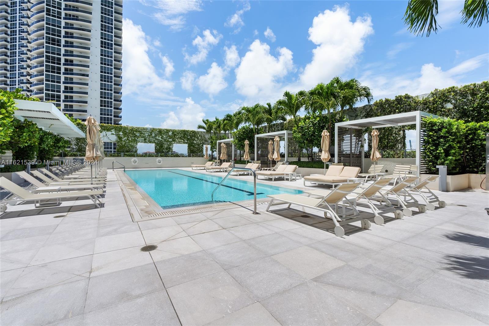 450 Alton Road, Unit 3106 Miami Beach, FL 33139 - Photo 35 of 40 a view of a terrace with sitting area