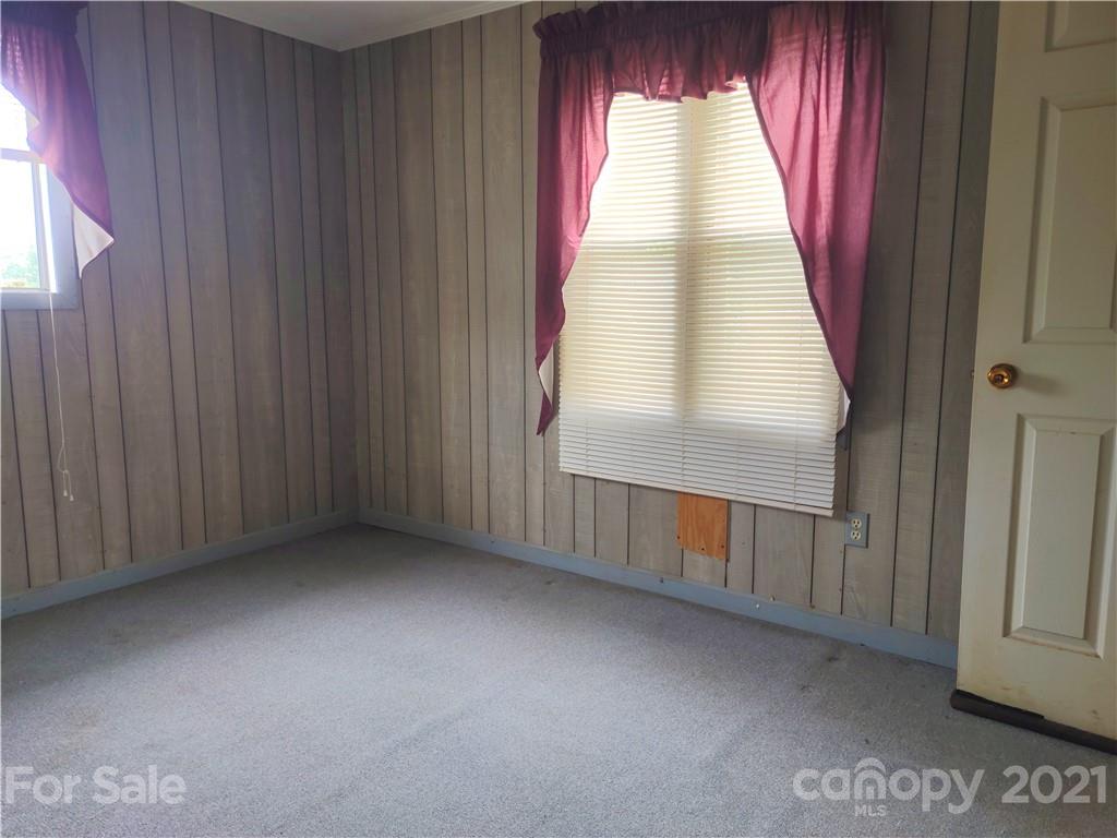 1731 Chambers Mountain Road Clyde, NC 28721 - Photo 19 of 37 an empty room with windows