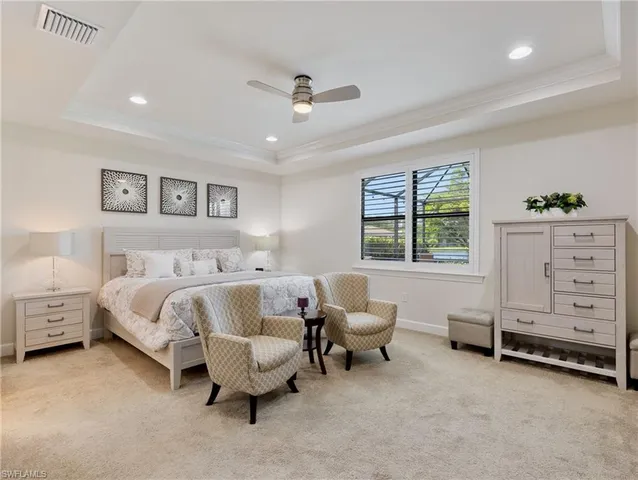 a bed room with a bed and a window