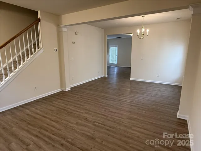 a view of a livingroom with wooden floor