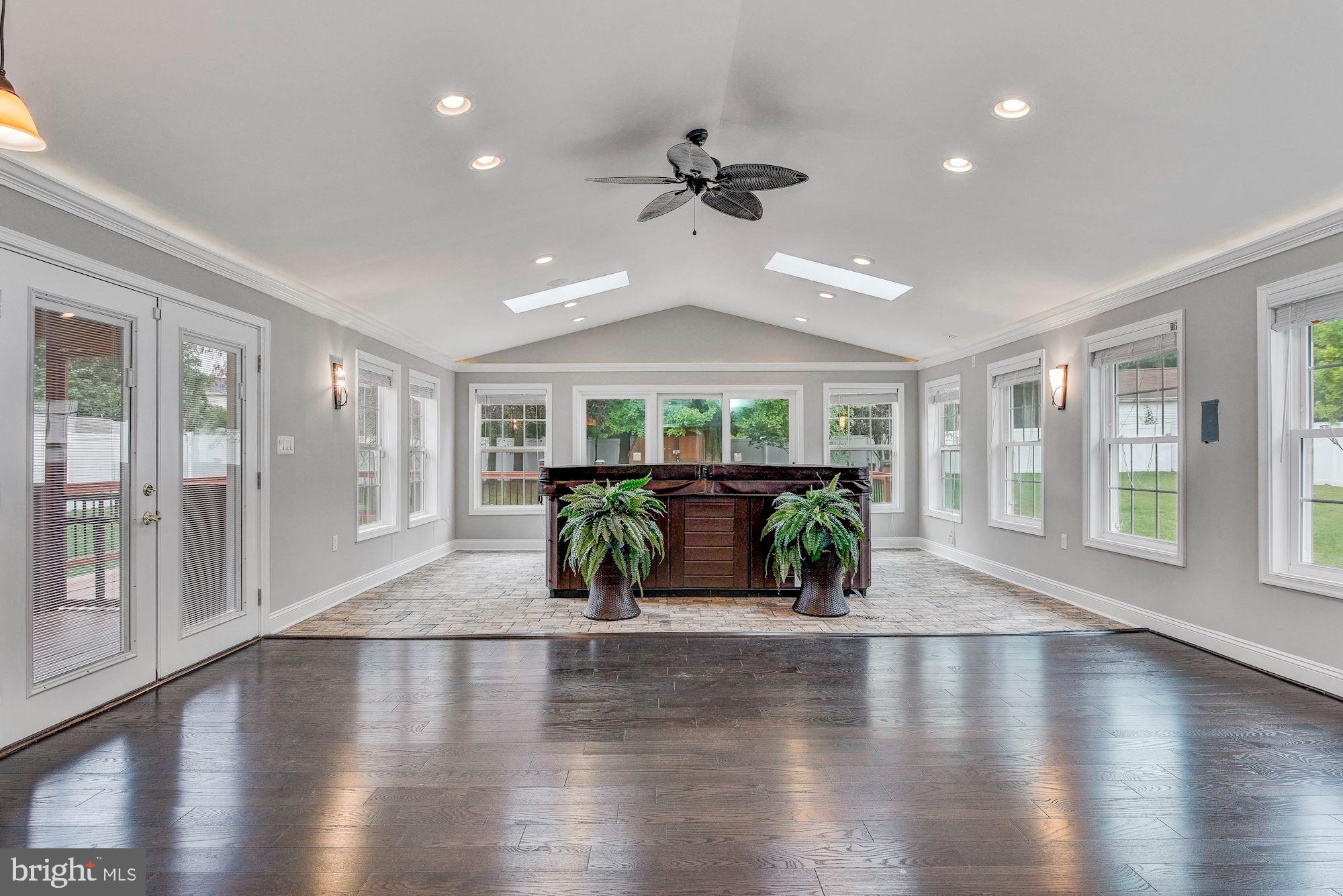 7838 Metacomet Road Hanover, MD 21076 - Photo 22 of 46 Sun Room | Over-Sized Hot Tub | Recessed Lights.