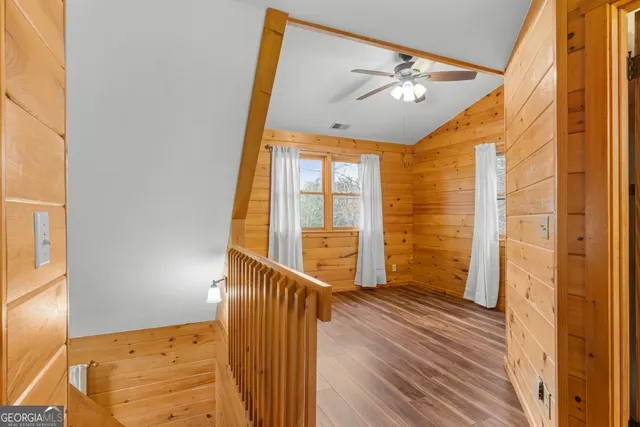 a bathroom with a sink and vanity